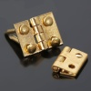 Charnières laiton miniature pour maison de poupée. Vue avec les clous