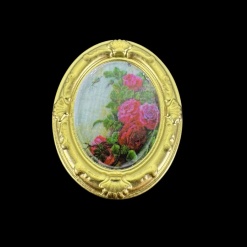 Tableau miniature ovale doré avec décor de roses sur fond noir
