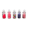Lot de 5 bocaux à bonbons miniatures en verre transparent, remplis de confiseries colorées.