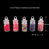 Lot de 5 bocaux à bonbons miniatures en verre transparent, remplis de confiseries colorées.