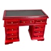 Bureau miniature en acajou avec neuf tiroirs et surface en simili cuir.