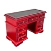 Bureau miniature en acajou avec neuf tiroirs et surface en simili cuir.