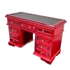 Bureau miniature en acajou avec neuf tiroirs et surface en simili cuir.
