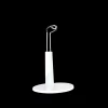 Support blanc pour poupée miniature de 15 cm en plastique et métal.