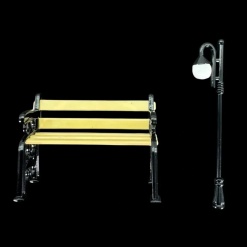 Banc et lampadaire miniatures en métal peint sur fond noir