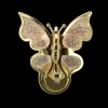Applique murale miniature en forme de papillon doré pour maison de poupée vue principale