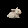 Lapin miniature en résine pour maison de poupée vue den coté fond noir