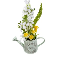 Arrosoir miniature fleuri blanc et jaune en métal vieilli vu de près
