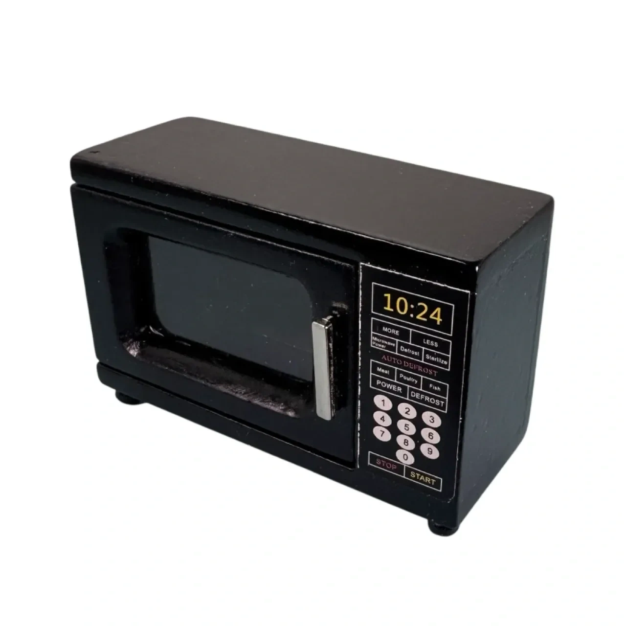 Micro-ondes miniature noir en bois avec porte fermée