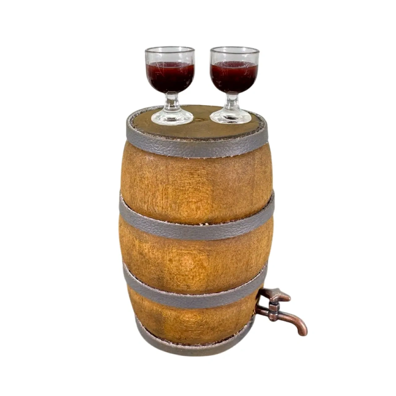 Tonneau miniature en bois avec 2 verres de vin rouge posés dessus