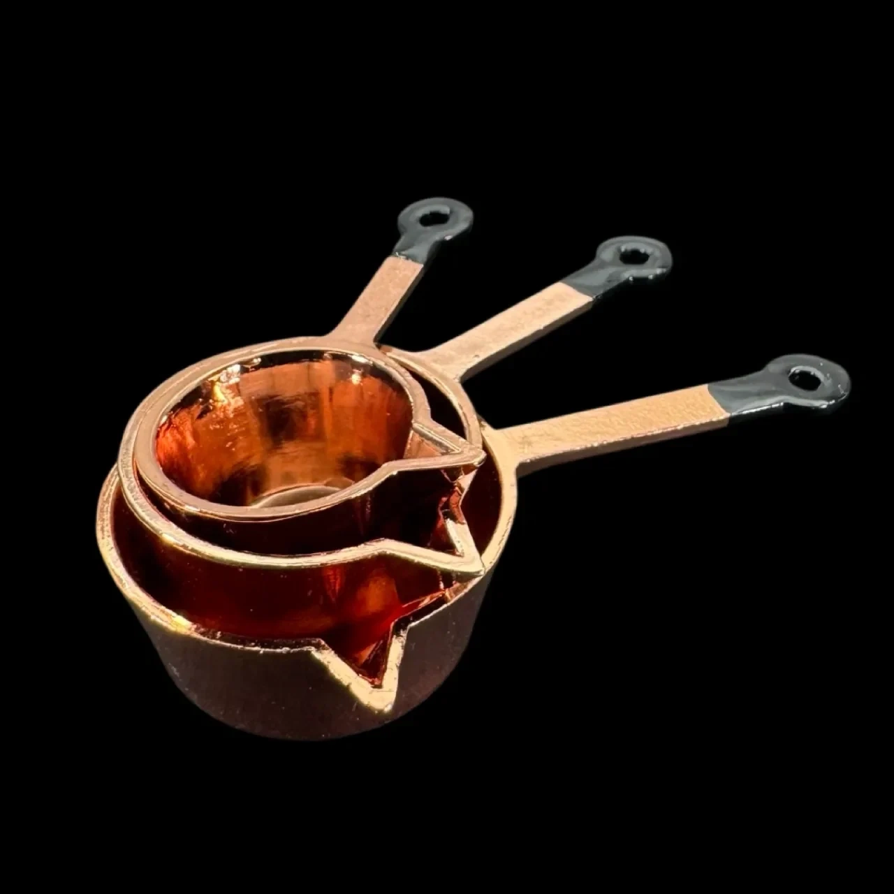 Lot de 3 casseroles miniatures cuivrées avec manches noirs