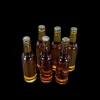 Lot de 6 bouteilles miniatures ambre en résine translucide
