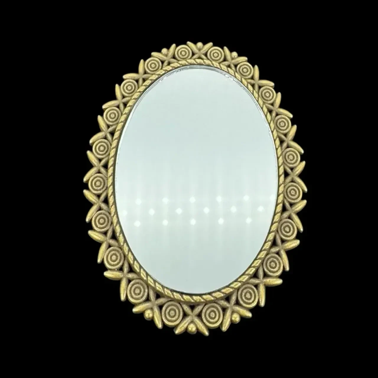 Miroir miniature ovale en métal doré à décor floral