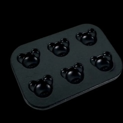 Moule à gâteaux miniature noir avec 6 empreintes en forme de tête d'ours
