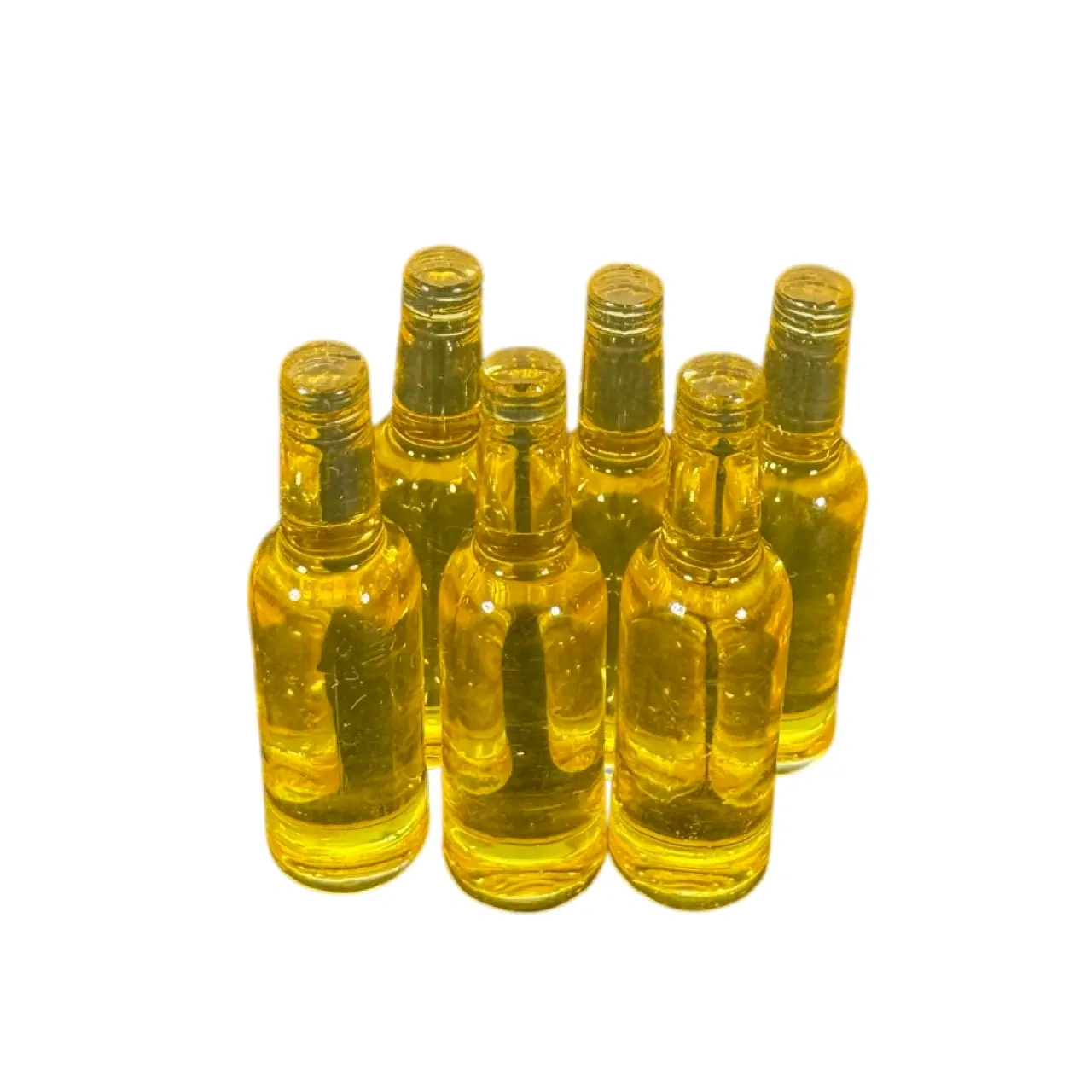 Lot de 6 bouteilles miniatures jaunes en résine sur fond blanc