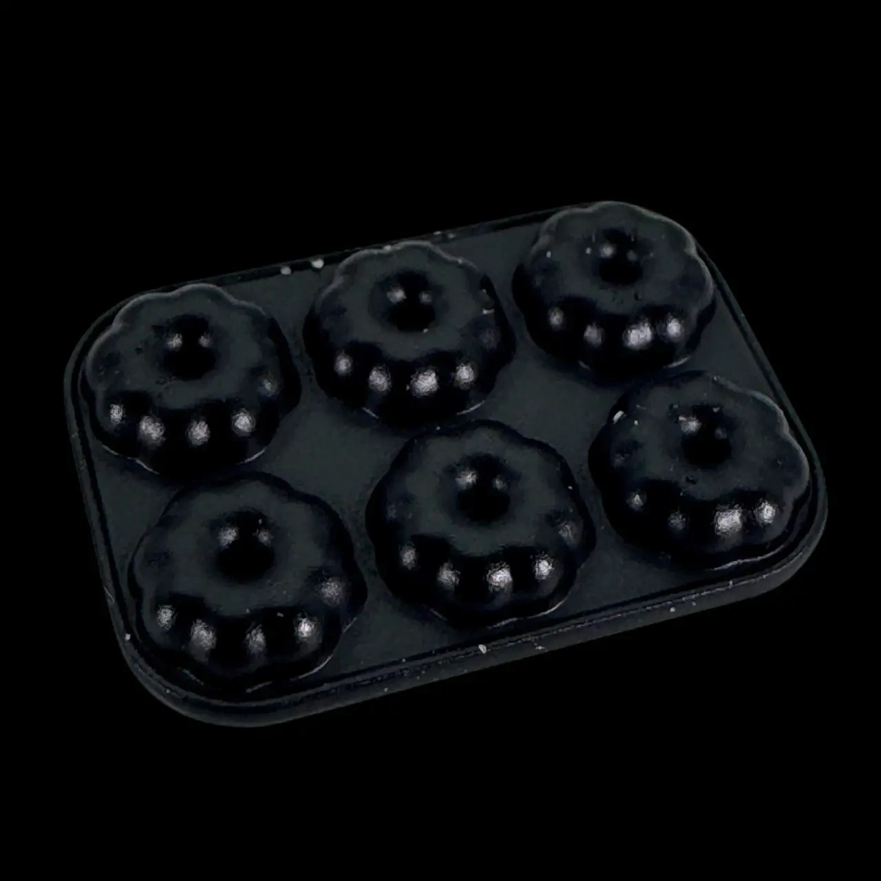 Dessous du moule à Kougelhopf miniature avec six empreintes