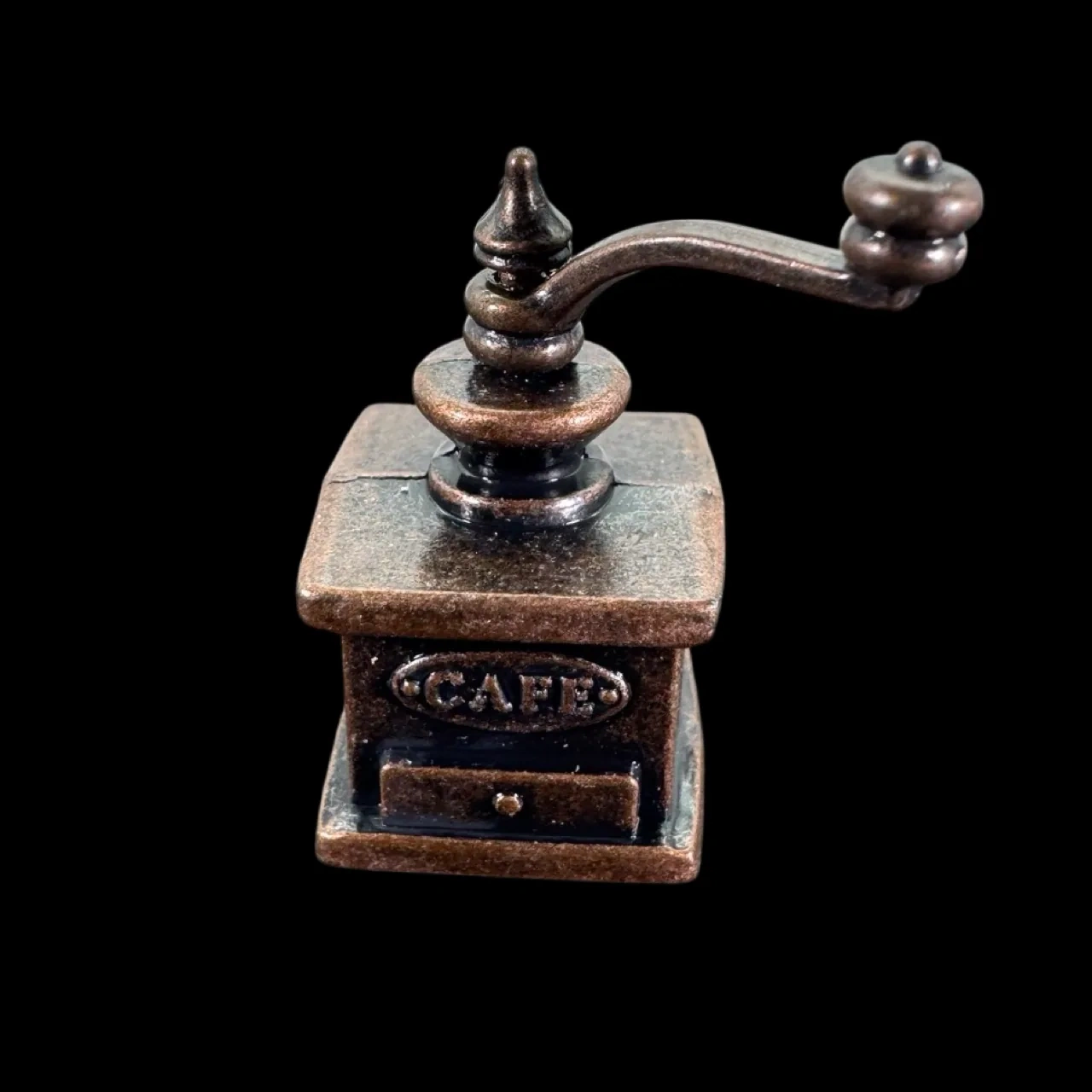 Moulin à café miniature bronze vu de face avec tiroir
