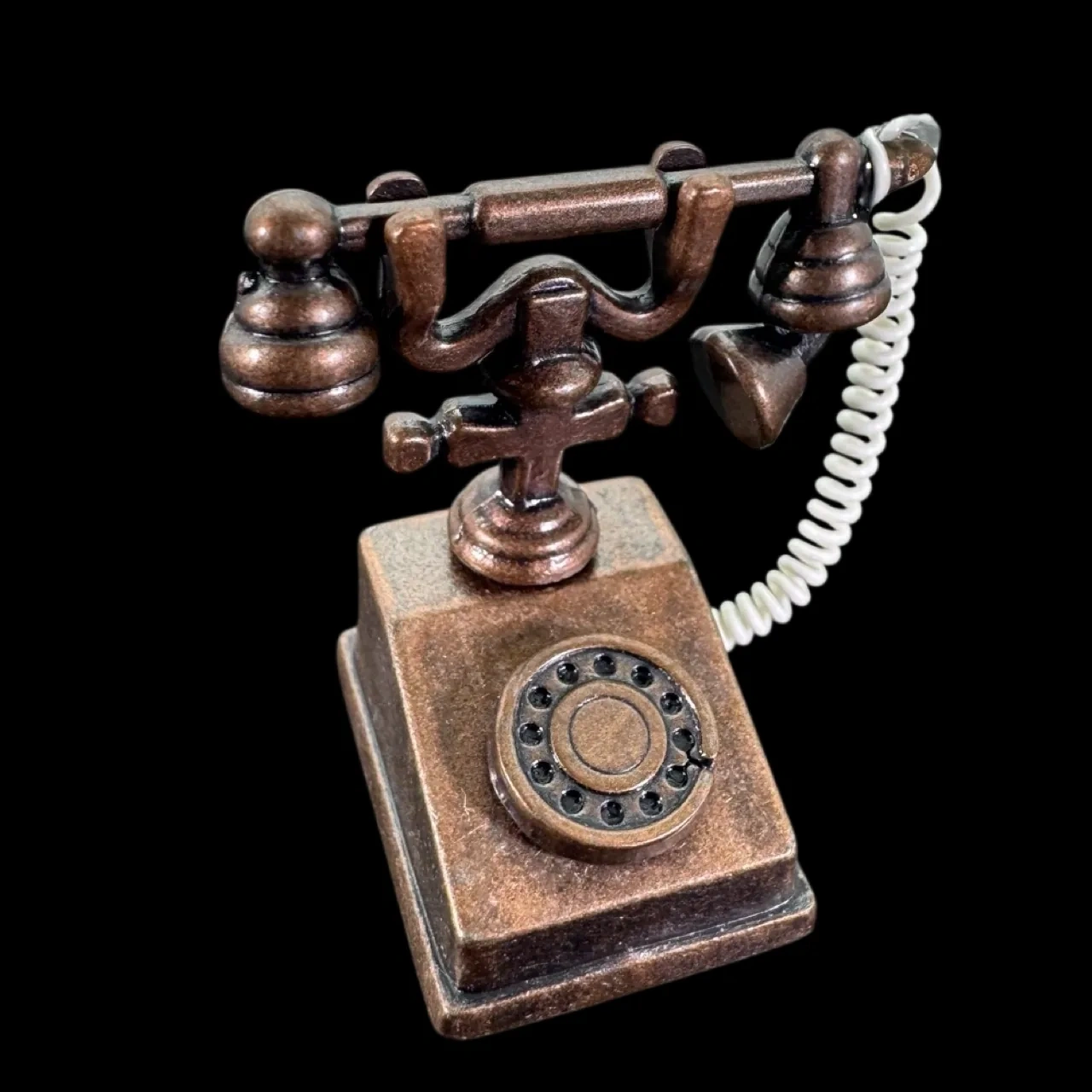 Téléphone rétro miniature bronze avec cadran et combiné amovible
