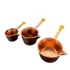 Lot de 3 casseroles miniatures cuivrées à manches jaunes sur fond blanc