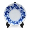 Support pour assiette miniature en métal noir vu de profil
